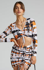 BY DYLN - Odette Mini Skirt in Orange Printed Mesh